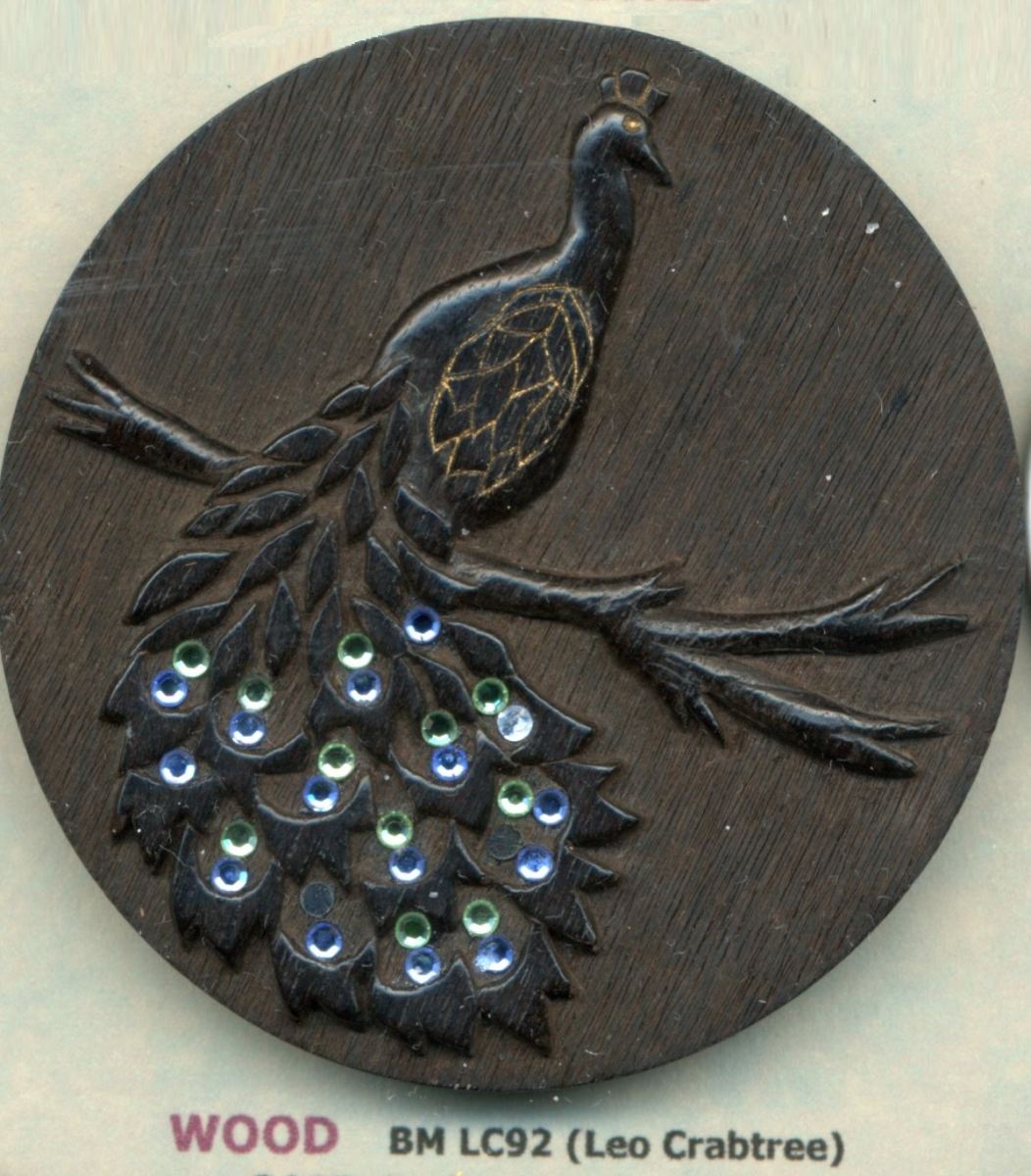 Peacock carved on wood