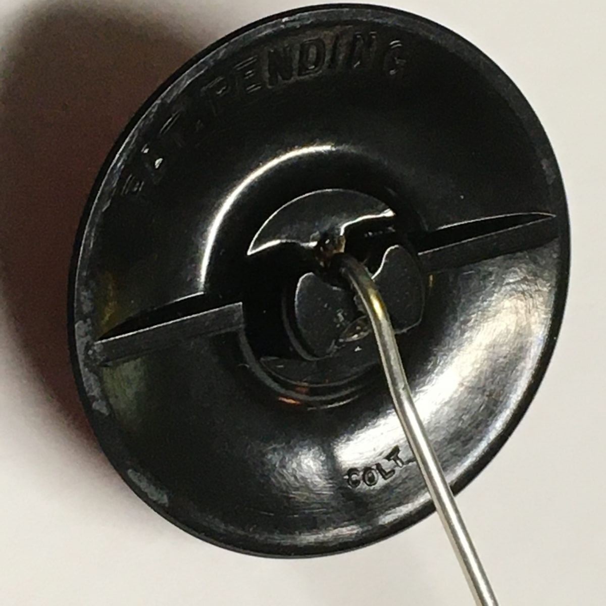 Colt Rouge Button as a Pin – Western Regional Button Association