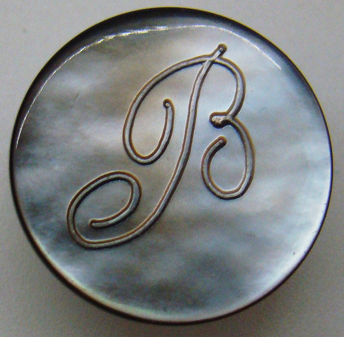 Logo of “B”