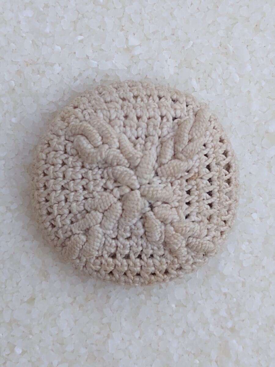Cotton “worked” button. Crochet.